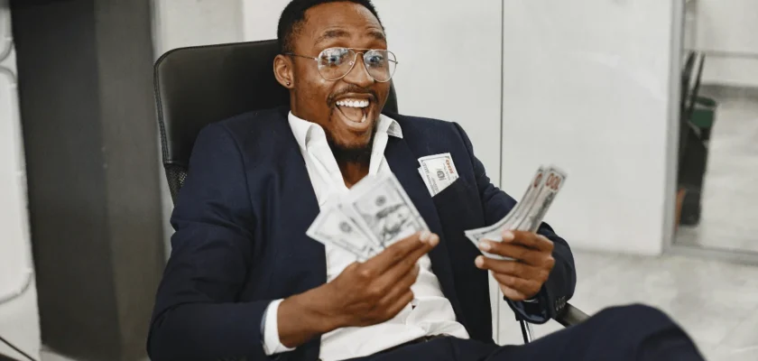 Happy Black Man With Money